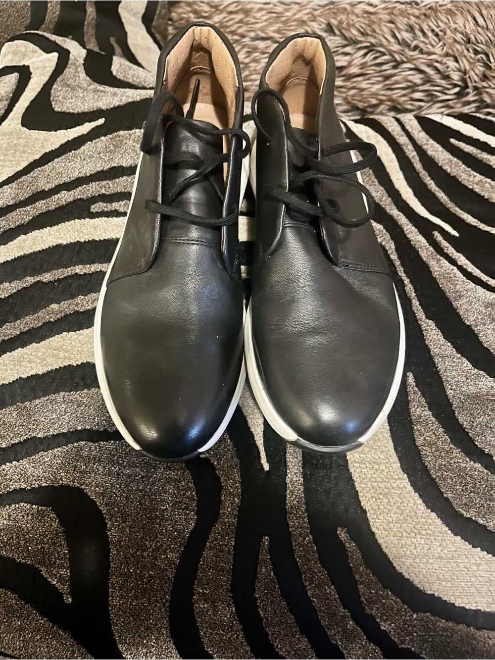 Unstructured Black Leather Clarks Lace-Up Ankle Booties with White Soles